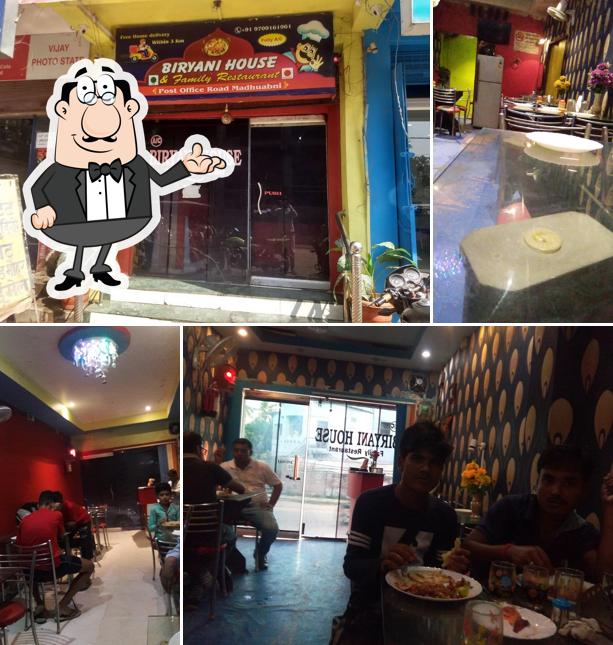 Take a seat at one of the tables at Biryani House