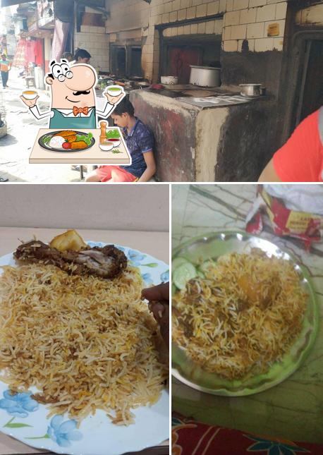 This is the image displaying food and interior at Laxmi Hindu Hotel
