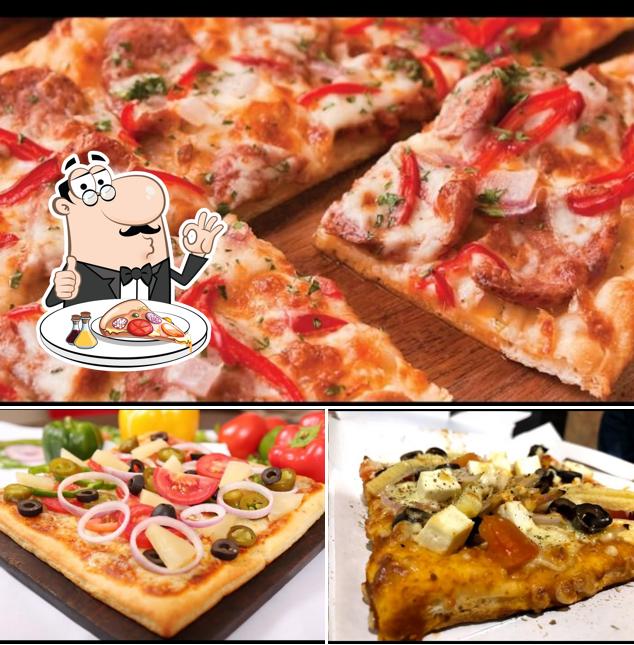 Try out pizza at Punjab Chicken Corner