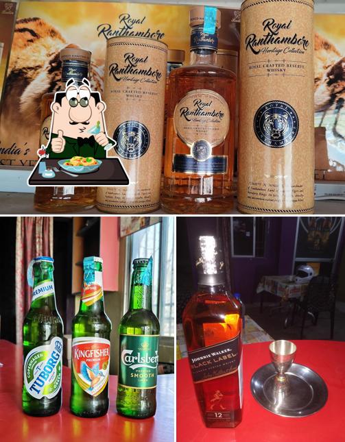 This is the image showing food and alcohol at Dhoom Restaurant Cum Bar