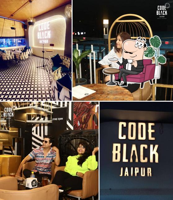 Take a seat at one of the tables at Code Black Jaipur