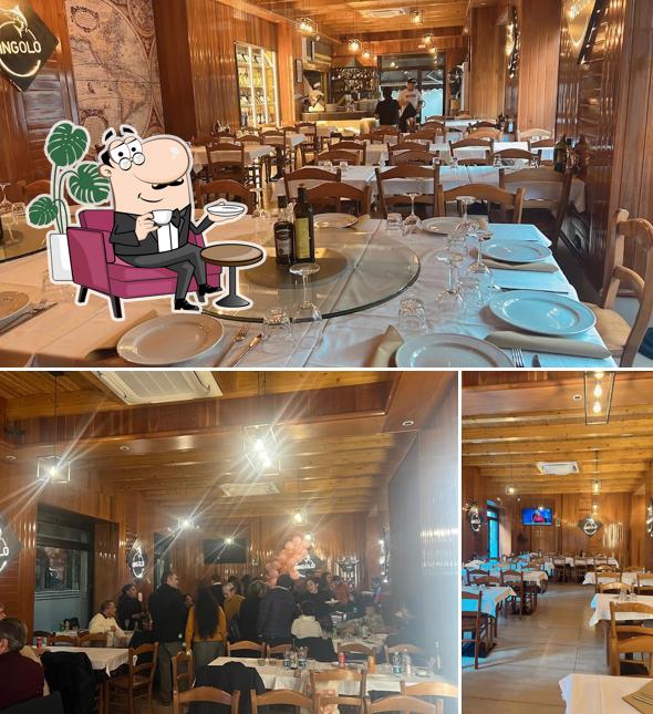 Dai un'occhiata agli interni di L'Angolo Della Pizza