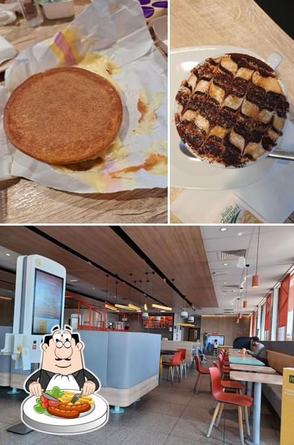 Questa è la immagine che mostra la cibo e interni di McDonald’s Caponago