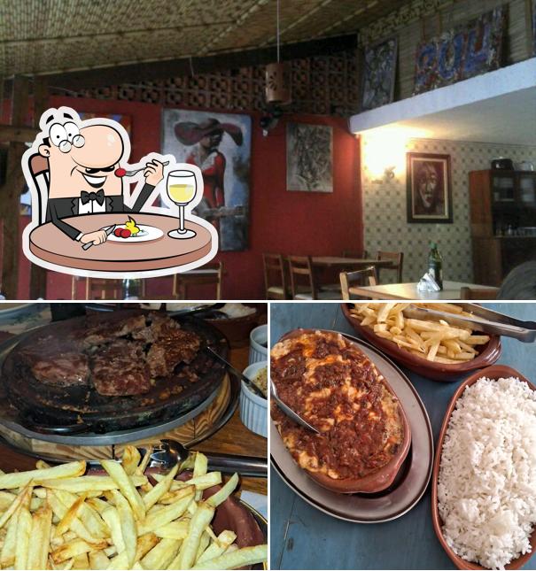 Esta é a ilustração apresentando comida e interior no Picanha na Pedra e Bar do Zulu