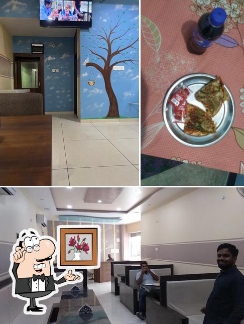 Take a seat at one of the tables at Papa Razzi Restaurant