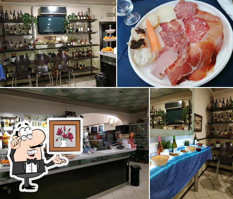 Questa è la immagine che mostra la interni e cibo di Blue Bar