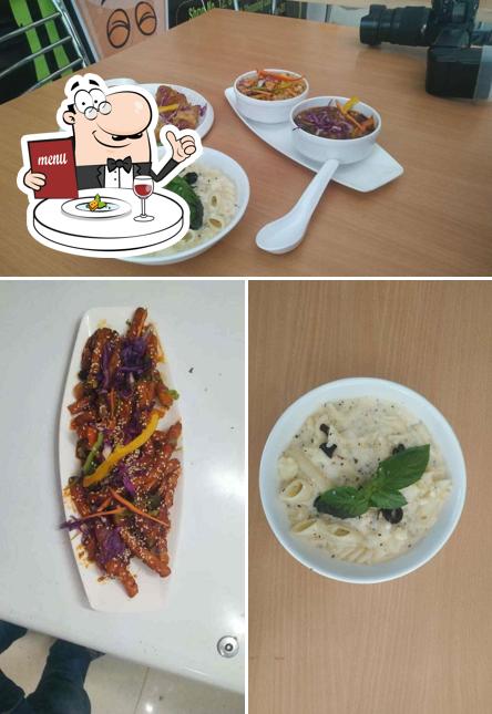 Check out the photo showing food and dining table at FM 20