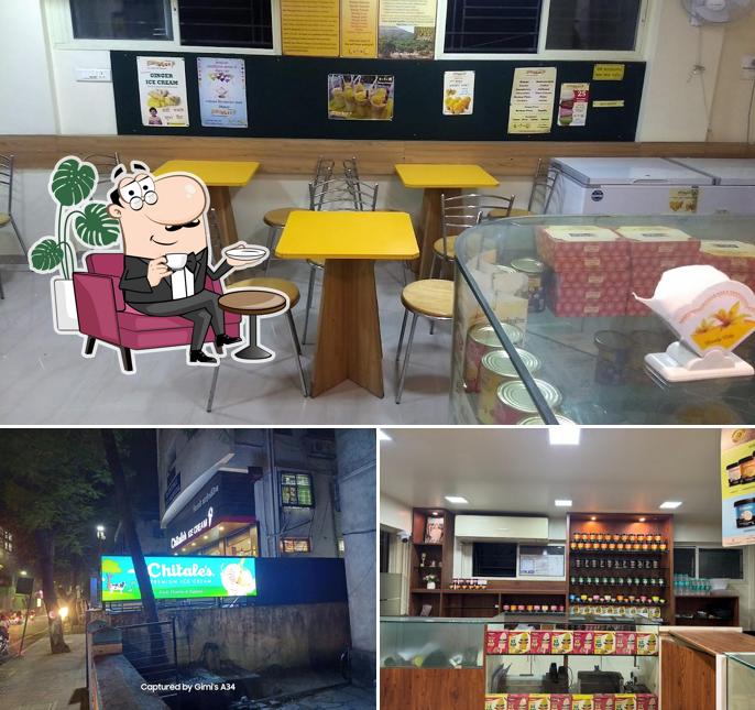 Take a seat at one of the tables at Chitale Ice Cream