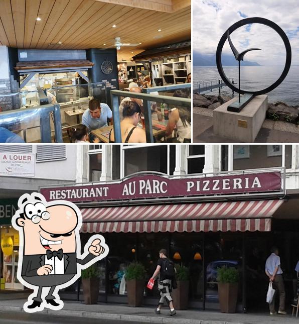Siediti a un tavolo di Restaurant Pizzeria Au Parc