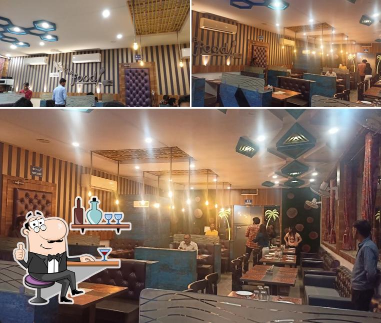 Take a seat at one of the tables at The food Restaurant