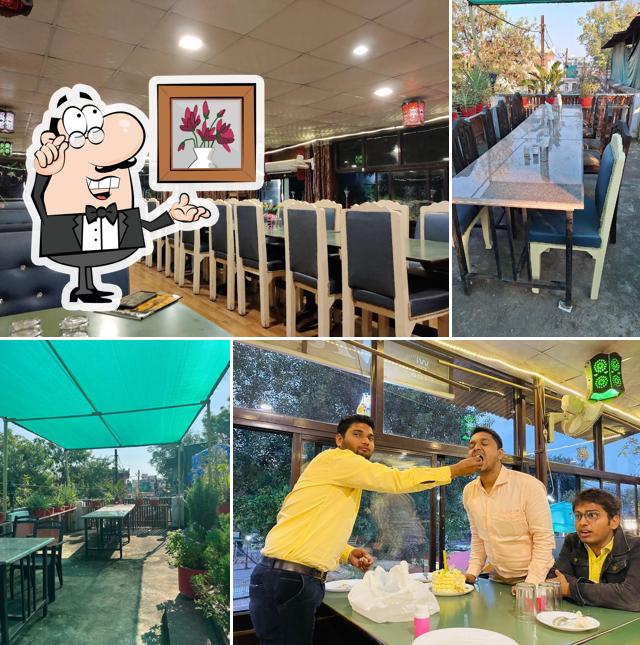 Take a seat at one of the tables at Maharaja Cafe & Restaurant