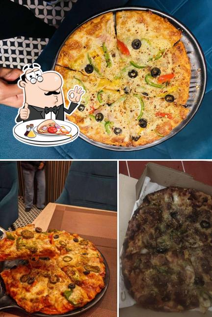 Pick pizza at Cozy Cafe - BEST INDIAN RESTAURANT