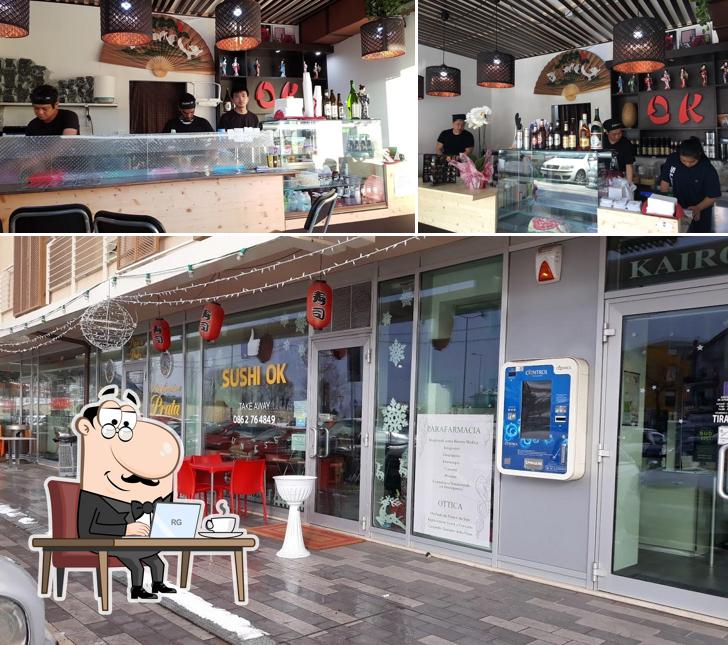 Guarda la immagine che raffigura la interni e bancone da bar di Sushi OK