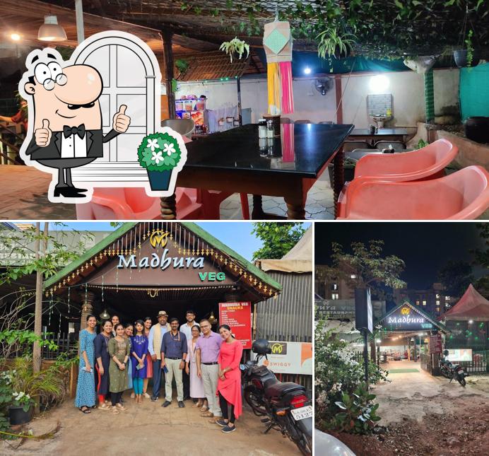 The photo of Madhura Veg Restaurant’s exterior and interior