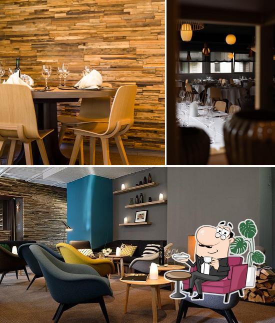 Dai un'occhiata agli interni di Restaurant Carbon Zermatt by Romain Fornell