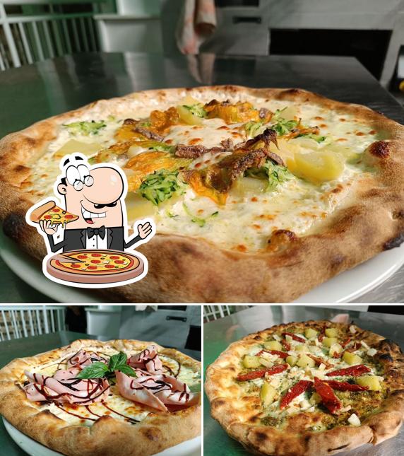 Prenditi una pizza a TOMATTO Ristorante, Pizzeria, Bar & Sushi