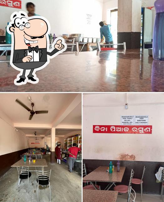 Take a seat at one of the tables at Mahakali Sweets and Snacks