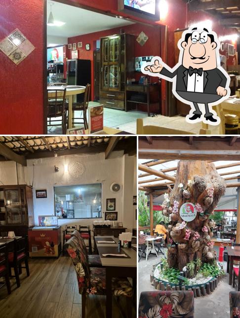 Sente em uma das mesas no Marinata