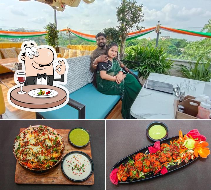 The photo of food and interior at Latitude Cafe & Restro