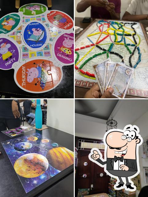 Take a seat at one of the tables at Untangle Teynampet - Puzzles & Board Games Cafe