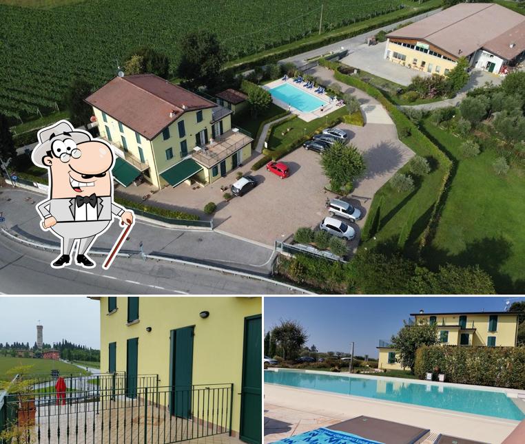 Curiosa tra gli esterni di Albergo Quattro Pini