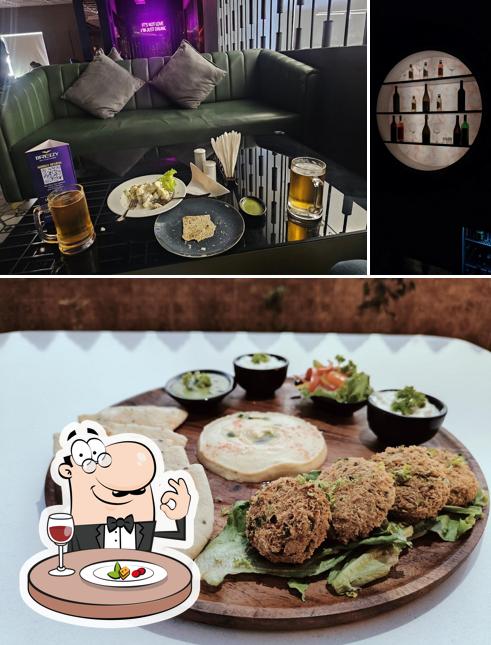 This is the image depicting food and beverage at Breezy Bar Club Lounge