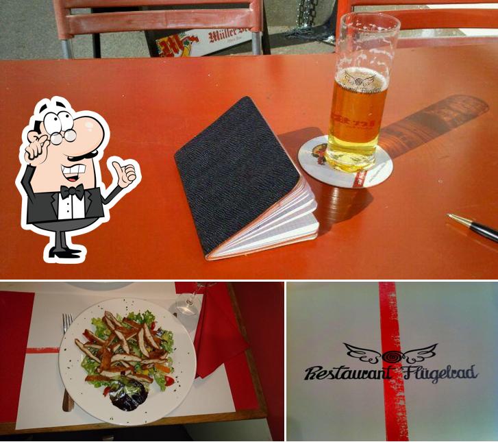 Siediti a un tavolo di Restaurant Flügelrad
