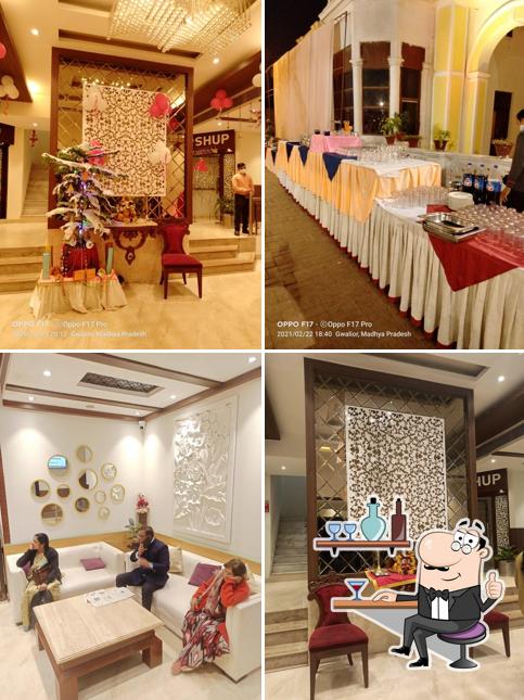 Take a seat at one of the tables at Hotel Landmark, Gwalior