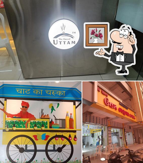 THE GRAND UTTAM BHAJIYA & CHAAT is distinguished by interior and beverage