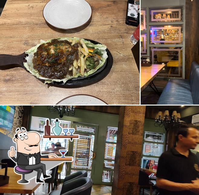 Take a seat at one of the tables at Cafe Karma