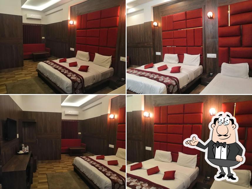 Take a seat at one of the tables at Hotel Kanha