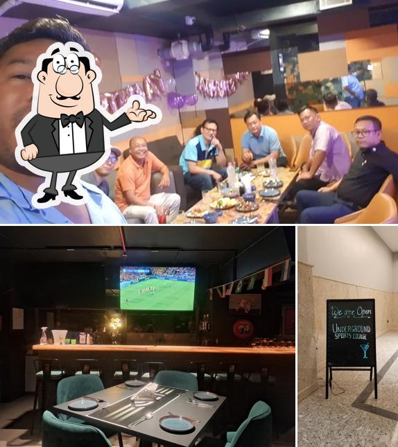 Take a seat at one of the tables at UNDERGROUND SPORTS LOUNGE