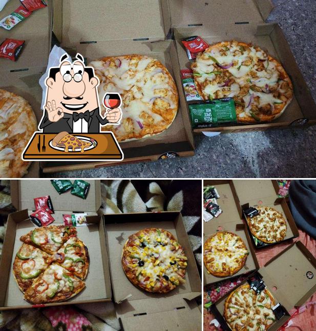 Get pizza at Eat N Bite