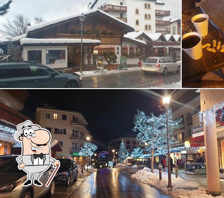 Questa è la immagine che mostra la esterno e cibo di Moon Bar
