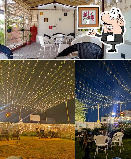 Take a seat at one of the tables at Chipotle Cafe & Cuisine