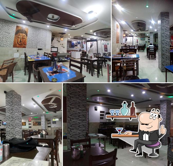 Take a seat at one of the tables at Kala Momo Point