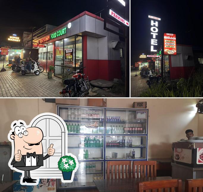 Check out the image showing exterior and interior at Al-Raydan Foodcourt