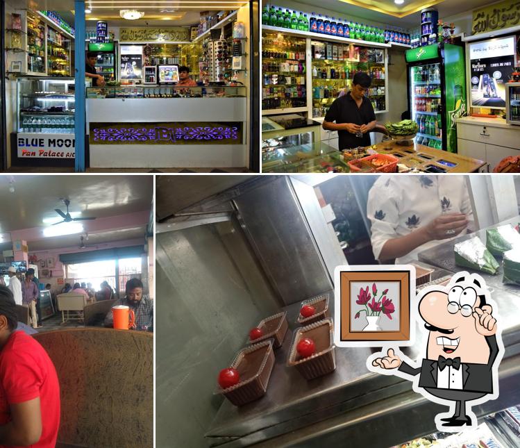 Take a seat at one of the tables at Hotel Blue Moon