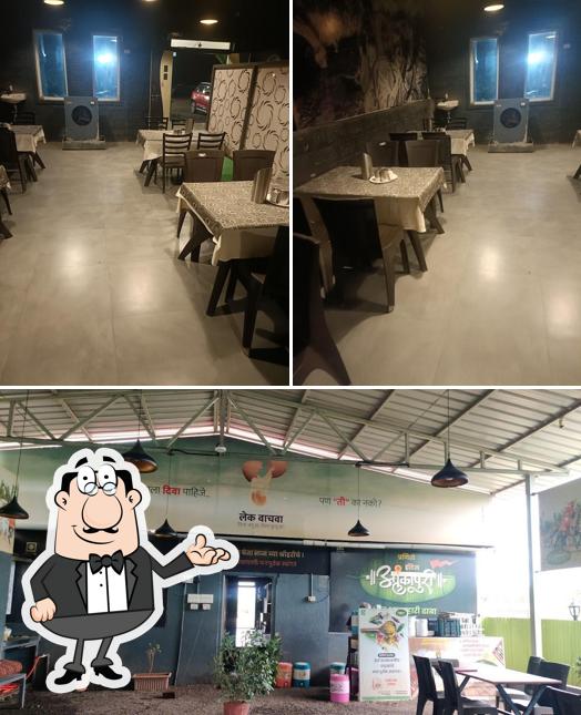 Take a seat at one of the tables at Praniti Hotel Alankapuri