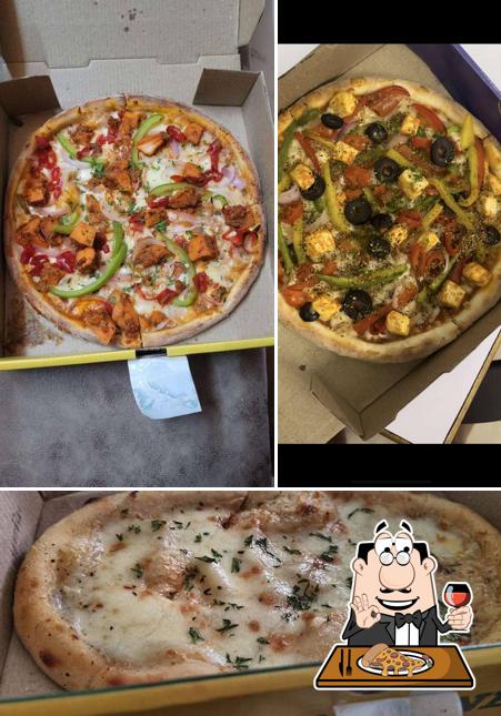 Pick pizza at Olio - The Wood Fired Pizzeria