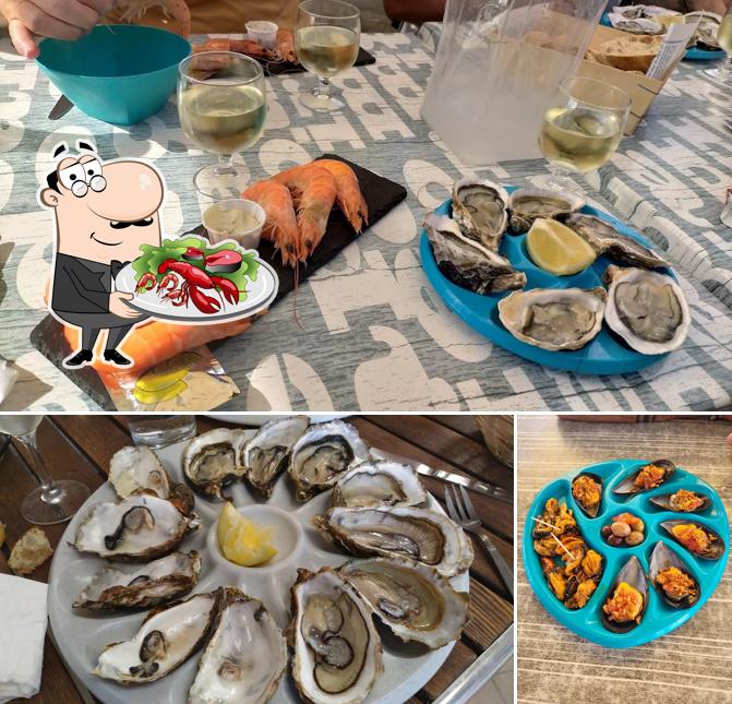 Essayez des fruits de mer à Coqui Thau