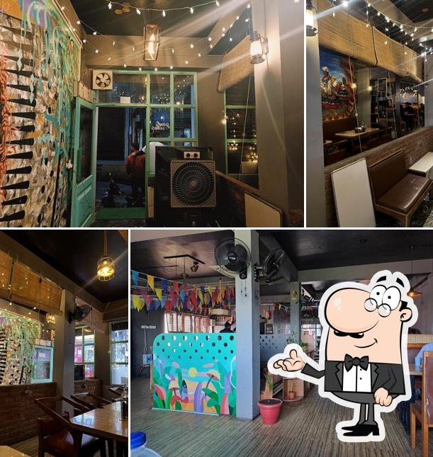 Take a seat at one of the tables at Cafe Zero 1