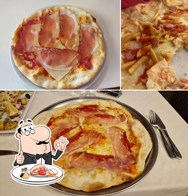 A Ristorante Pizzeria SAN GREGORIO, puoi provare una bella pizza
