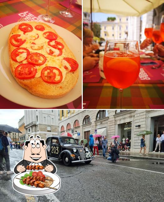 Questa è la foto che presenta la cibo e esterno di Bar Millenium