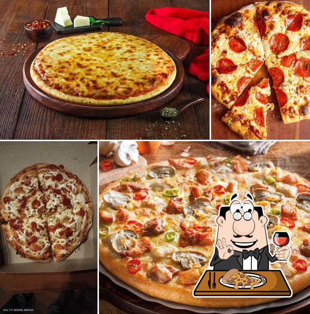Get pizza at Ajay Cafe & Fast Food