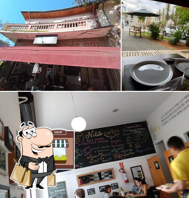 Dê uma olhada a imagem mostrando exterior e quadro-negro no Nelito Bar e Restaurante