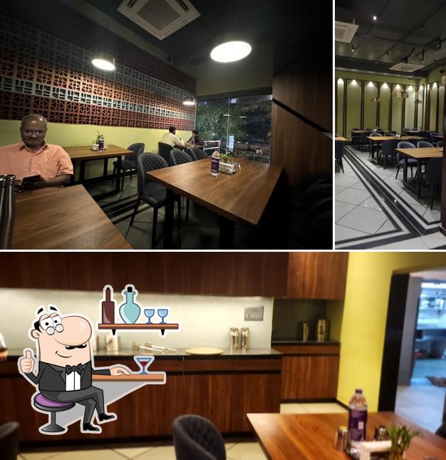 Take a seat at one of the tables at HASHTAG KOLHAPUR - The best Thali restaurant in Kolhapur