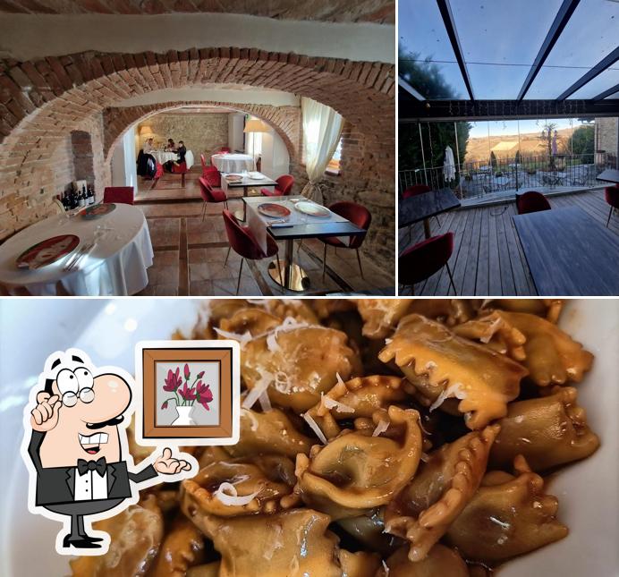 Questa è la immagine che mostra la interni e cibo di Osteria l'11