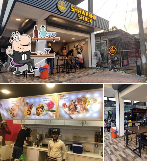 Take a seat at one of the tables at Shawarma Shack