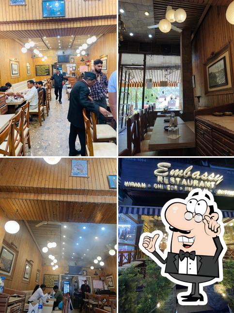 Take a seat at one of the tables at Embassy Restaurant